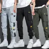 Herrbyxor tunna design män byxor jogga militär lastbyxor avslappnade arbetsspår byxor sommar plus storlek joggers mäns kläder lärkläder 230211