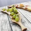 Platen creatieve handgemaakte gehele houten plaat gebogen bonenvorm houtkamermoer snack serveerlain home decoratie