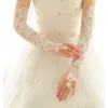 Fem fingrarhandskar Operationslängd Lång bröllopsklänningshandskar Kristaller Diamond Gaze Brodery Elegant Womens Lace Bridal Gloves Wholesale Price 230210