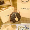 2023 Bags Clearance Outlets Hong niche design cake leather messenger round small women's shoulder bag 2023 fall new