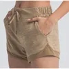 Ll596 shorts de ioga feminina roupas de alta cintura alta fiess use meninas curtas que executa calças elásticas para evitar o mau funcionamento do guarda -roupa