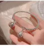 Bracelet étape par explosion Style Double cloche Bracelet haute qualité Net rouge ligne torsadée Simple Couple copines BraceletBangle