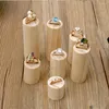 Smyckespåsar 7 stycken Naturlig omålad vanlig cylinder träring Display Stand Holder Organizer