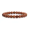 Fios de miçangas misioneiros jóias de bracelete de pedra natural homens mulheres mulheres feitas à mão redonda Goldstone lava tigereye charme pulseira por atacado