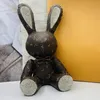 Porte-clés de créateurs faits à la main Dragonne multicolorestrass lapin animaux en peluche jouets en cuir PU fleur marron dessin animé cadeaux d'anniversaire de noël pour femmes enfants 675