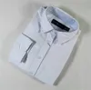Nieuwe stijlen dames shirts blouse solide kleur pony borduurwerk dames klassieke mode t-shirt knop revers slank shirt