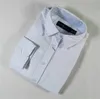 Nya stilar kvinnors skjortor blusa fast f￤rg kvinnor sm￥ h￤st broderier damer klassisk mode t-shirt knapp lapel skjorta