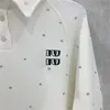 23SS Diseñador para mujeres Pantisetas de dos piezas Conjuntos de trajes de atuendo con patrón de letras Camisas de salida de la pista