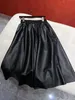 Skirts Designer 22 Autumn and Winter New Fashion Triangle Shows Thin Large Hemline Versatile Leather Skirt JRNA