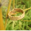 Bangle Nilerun Fashion Novidade unissex Três círculos Anéis empilhados Bracelete de vime de raiz de bambu larga para casais homens e mulheres