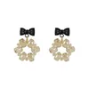 Boucles d'oreilles cerceau noir nœud papillon femmes cercle cristal argent aiguille femmes Costume filles bijoux