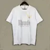 2023 Designer Summer Mens T Womens Rhude Shirt For Men Tops Letter Polos broderi Tshirts kläder Kort ärm Tshirt Stora tees