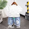 Kledingsets Zomer Nieuwe Leisure Kids Boy Deset Jaren Jaren voor kinderen Girls Star STEET Gedrukt T -shirt gescheurde jeans