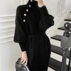 Camisolas femininas 2023 Vestidos de casacão preto com nervuras de outono para mulheres de suéter de suéter apertado por muito tempo sobre a túnica de malha de fundo do joelho