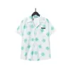 Button 22ss Designer Shirt Mens Up Camicie Stampa Camicia da bowling Hawaii Floral Casual Uomo Slim Fit Abito manica corta T-shirt hawaiana1rfz