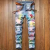 Mäns jeans högkvalitativa stretch män rippade hål denim lapp design graffiti målar streetwear mode hip hop skinny byxor