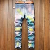 Mäns jeans högkvalitativa stretch män rippade hål denim lapp design graffiti målar streetwear mode hip hop skinny byxor