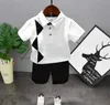衣類セットボーイSスーツ夏の綿の幾何学的パターンスリーブショーツベビー服の男の子の服