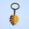 Key Rings Wooden Leaf Plant Keychain Key Ring For Women Men Couple Gift New Unique Resin Wood Splice Bag Car Key Charm Accessories Jewelry G230210