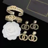 2023 Earrings and Bracelets Genuine Leather Gold Plated Cutout Fashion Set Women's Designer Pearl Earring Bracelet Wedding Gift Jewelry