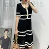 Casual Dresses Designer SS21 Women's New French Temperament Round Neck Waist Stripe Color-blocking Hollow Wave Mid-length Dress PFSU