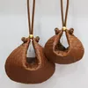 Bolso de mano con giro mediano Bolso pequeño de cuero intrecciato con correa ajustable Bolso Diseñador de moda Bolsos de embrague Bolsos de hombro para mujer Nuevos bolsos de mano