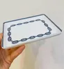 Plates High-End Exquisite Pig Nose Tray Tide Brand Ceramic Rectangular Plate Classic Chain Dessert Decorative Accessories