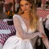 Abiti da festa 2023 Sparkle Luxury Beach Wedding per le donne maniche lunghe collo in tulle abiti da sposa ALine Sweep Train Vestido De Novia 230214