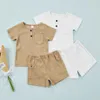 Set di abbigliamento per bambini ragazzi ragazze abiti casual vestiti estate solide cortometrali top rotondi pantaloncini elastici