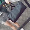 Designermen Women Travel Bag PU 가죽 더플 백 브랜드 브랜드 디자이너 수하물 핸드백 대용량 스포츠 bag323m