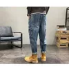 Jeans da uomo Streetwear Modello da uomo Pantaloni mop blu Moda Hip Hop Tasche multiple Salopette a gamba larga Temperamento Autunno versatile