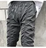 Pantaloni da uomo Street High Casual American Streetwear Hip Hop Draswring Design piegato Pantaloni Elastico in vita 2023 2Y6623