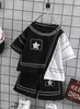 Abbigliamento Abbigliamento per bambini Completo per ragazzi Completi estivi Bambini Casual Cuciture in bianco e nero Maglietta a maniche corte irregolare Pantaloncini Due pezzi