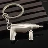 Porte-clés Mini outil porte-clés en acier inoxydable pince à pelle en métal porte-clés accessoires hommes sac à dos de voiture porte-clés pendentif petit cadeau