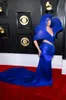 La 65e cérémonie des Grammy Awards - Robe de soirée longue avec fil bleu sur tapis rouge