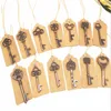 50pcslot Antieke bronzen metalen skelet sleutelvorm flesopener met tag rustieke bruiloft souvenir decor cadeaubry voorkeur voorraden