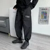 Męskie spodnie Czarne spodnie ładunkowe Mens Hip Hop Streetwear Mash