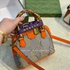 Buen ver bolso de bambú de concha bolso de diseño de moda Tote con cordón en las axilas Bolsos de cubo Diseñador de moda bolso de mano para mujer Bolso cruzado para mujer Cuero de lujo