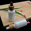Förvaringsflaskor 30 ml Pearl White Glass Droper Bottle Wood Lock Bamboo Cap Cosmetic Essential Oil Pipette Container