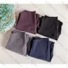 Leggings da allenamento da donna Designer Pantaloni da yoga Vita di alta qualità 32 colori Abbigliamento sportivo da palestra Lussi classici Pantaloni cargo da fitness elastici per uomo