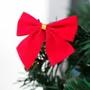 Décorations de Noël Ornements Bowknot 12Pcs / Pack Belle Couleur Vive Attrayante Joyeux Arc Rouge Décoration Pour Festival