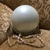 Luxury VIP gift Bags Ivory and Black Pearl ball clutch purse Paris fashion designer handbag clutch Wallet Lady Pearl chain sh278n