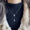 Collana rettangolare in cristallo da donna elegante V placcato in oro con pendente in zircone quadrato, gioielli per la festa nuziale, girocollo con catena a nappa