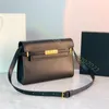 Äkta läder axelväskor mode kvinnor handväskor koppling lyxiga designer man kohude läder crossbody purses presbyopic tote berömda messenger väskor