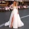 Abiti da festa 2023 Sparkle Luxury Beach Wedding per le donne maniche lunghe collo in tulle abiti da sposa ALine Sweep Train Vestido De Novia 230214