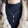 Collana rettangolare in cristallo da donna elegante V placcato in oro con pendente in zircone quadrato, gioielli per la festa nuziale, girocollo con catena a nappa