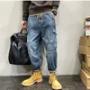 Мужская джинсовая уличная одежда Мужской узор синие швабры брюки мода хип -хоп множественные карманы широкие ноги.