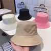 Re nylon hommes chapeau luxe designer casquette multicolore lavable simple triangle cappello mode soleil preuve à la mode habillé balck seau chapeaux pour femmes