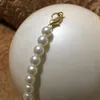 Luxe VIP -cadeauzakken Ivoor en zwarte parelbalkoppeling Pas Paris modeontwerper Handtas Handtas Wallet Lady Pearl Chain SH2212