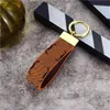 Designer Keychains Fashion Lanyards Mens Metal Keychain Leather Car Key Chain Bag Charm Pendant Unisex Keyring Classic Accessories Small Jewelry No Box